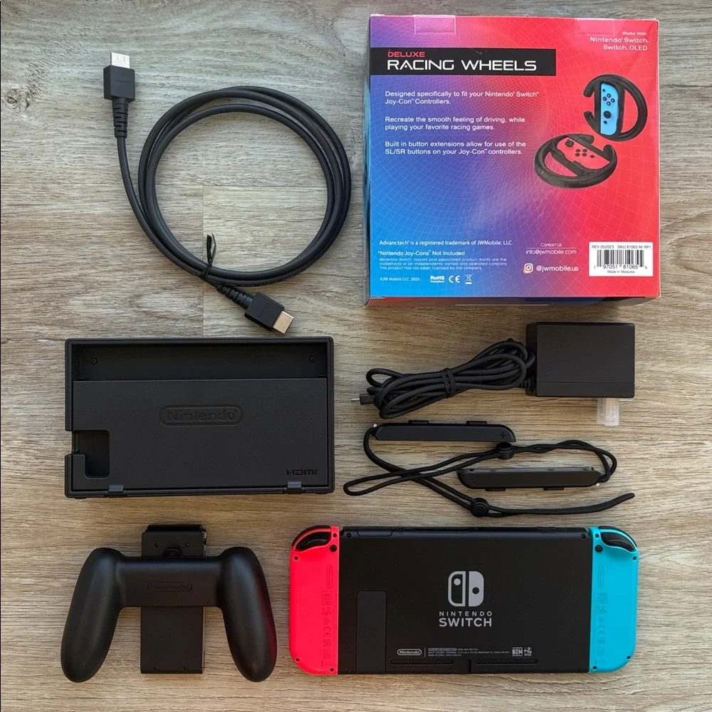 Complete Nintendo Switch Console + 2-Pc Racing Wheels Set ($10 value) - Picture 2 of 7